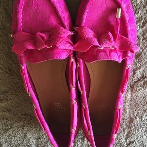 Pink coach boat shoes